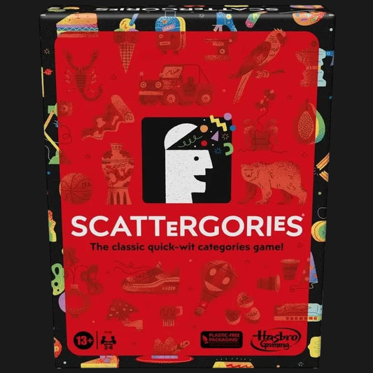The board game box for Scattergories, featuring a bright red front with illustrated category icons and the game title in large white letters. The box is photographed straight-on
